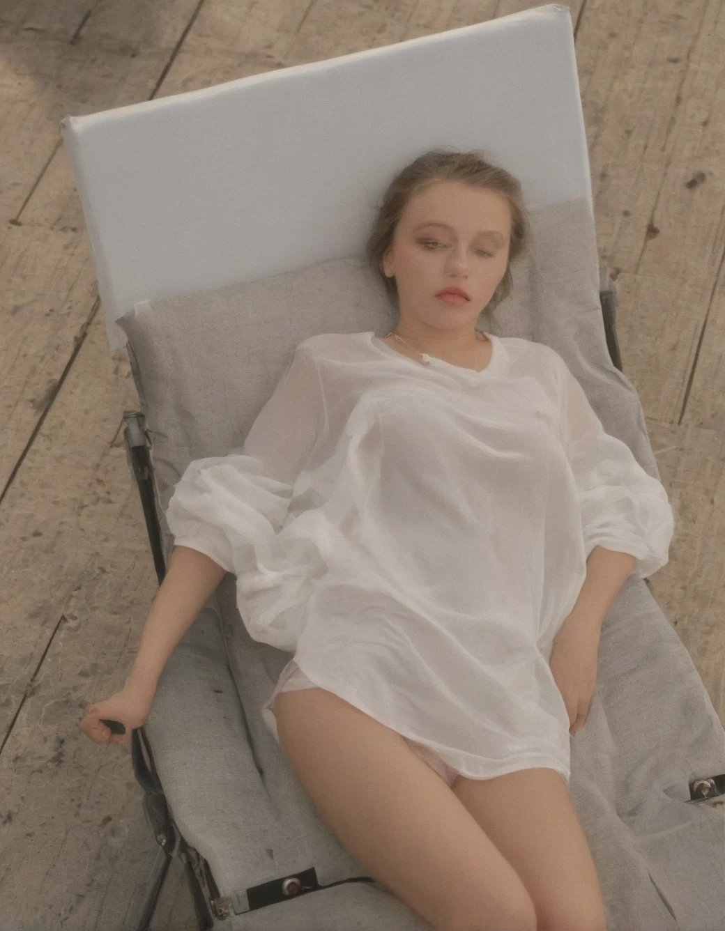 beautiful-russian-woman-lying-black-deck-aa49d0 on Juggernaut XL