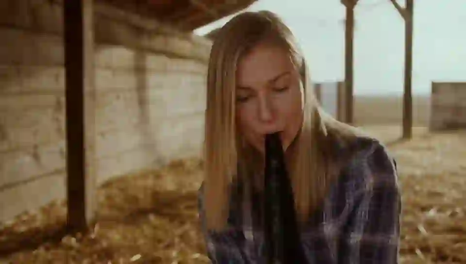 blonde woman sucking big black penis in a barn, realistic on HunyuanVideo